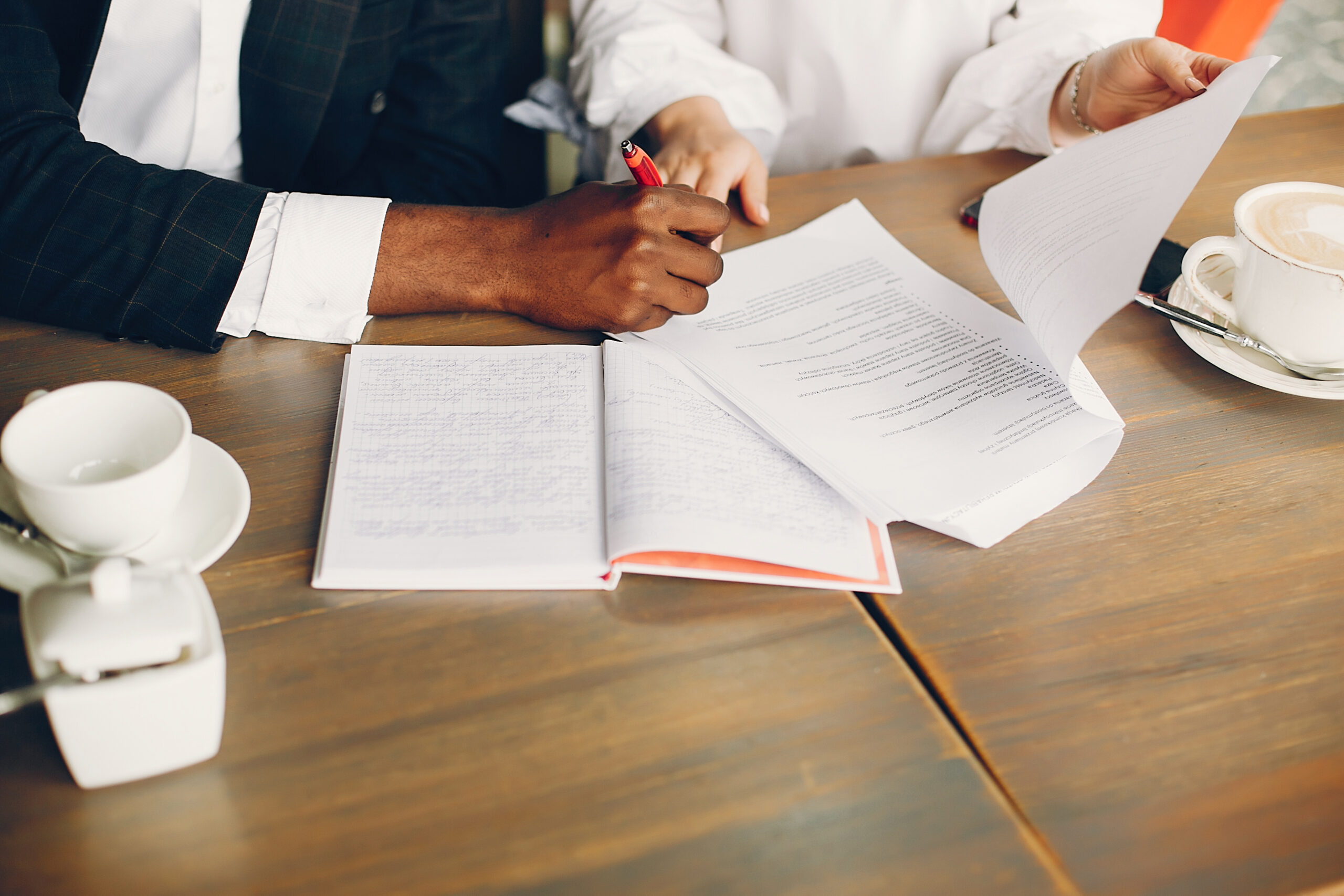 A man signing documents